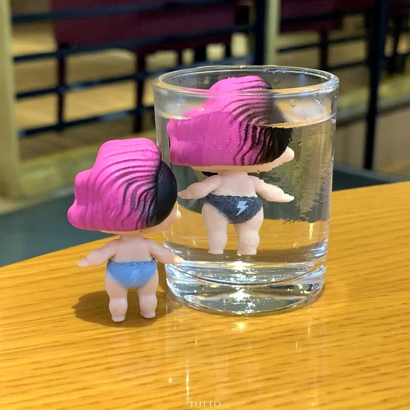 black lol doll with purple hair